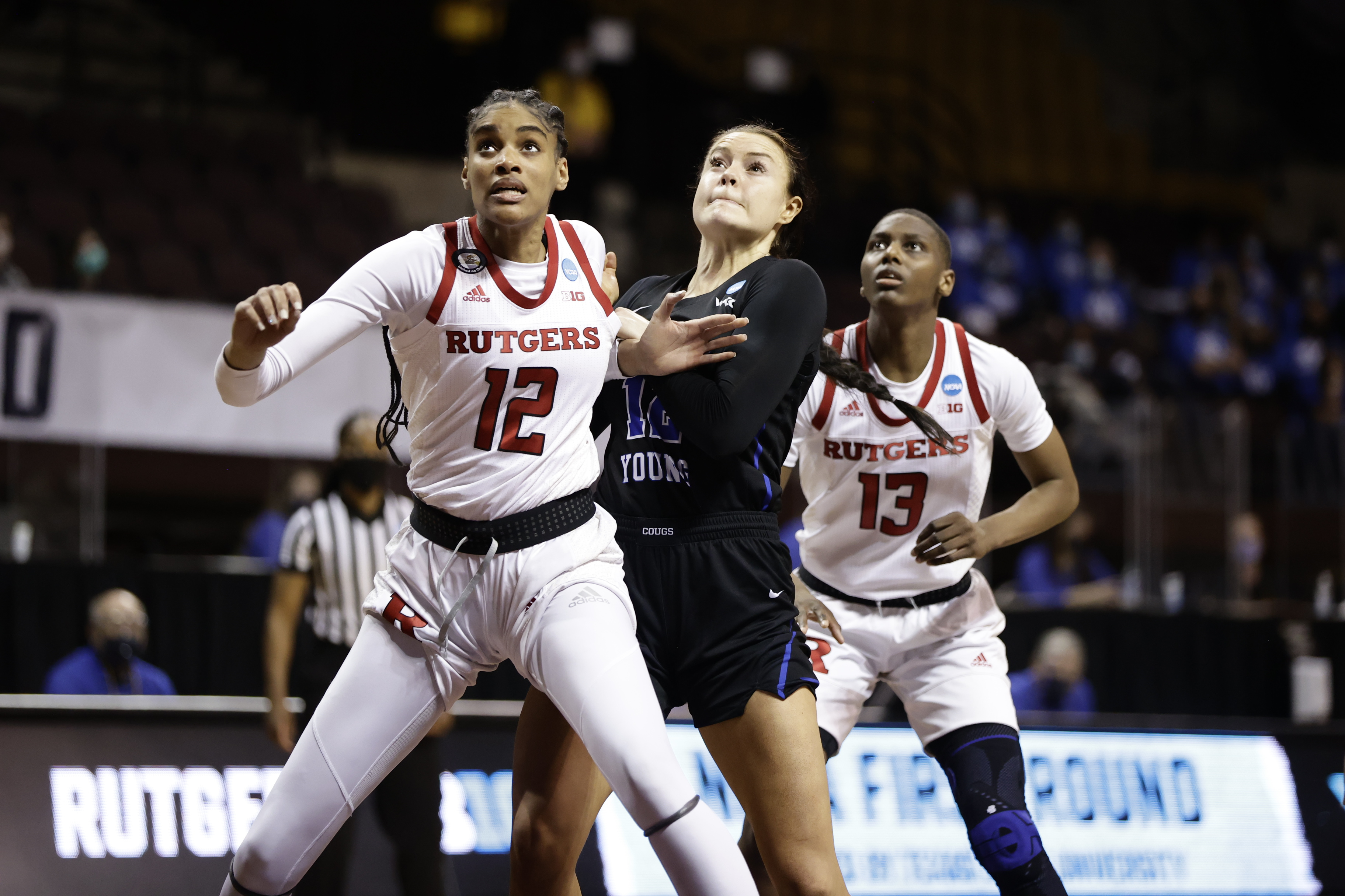 BYU forward Lauren Gustin battles down low with Rutgers' Sakima Walker against Rutgers in a NCAA women's basketball tournament first-round game Monday, March 22, 2021 in San Marcos, Texas.