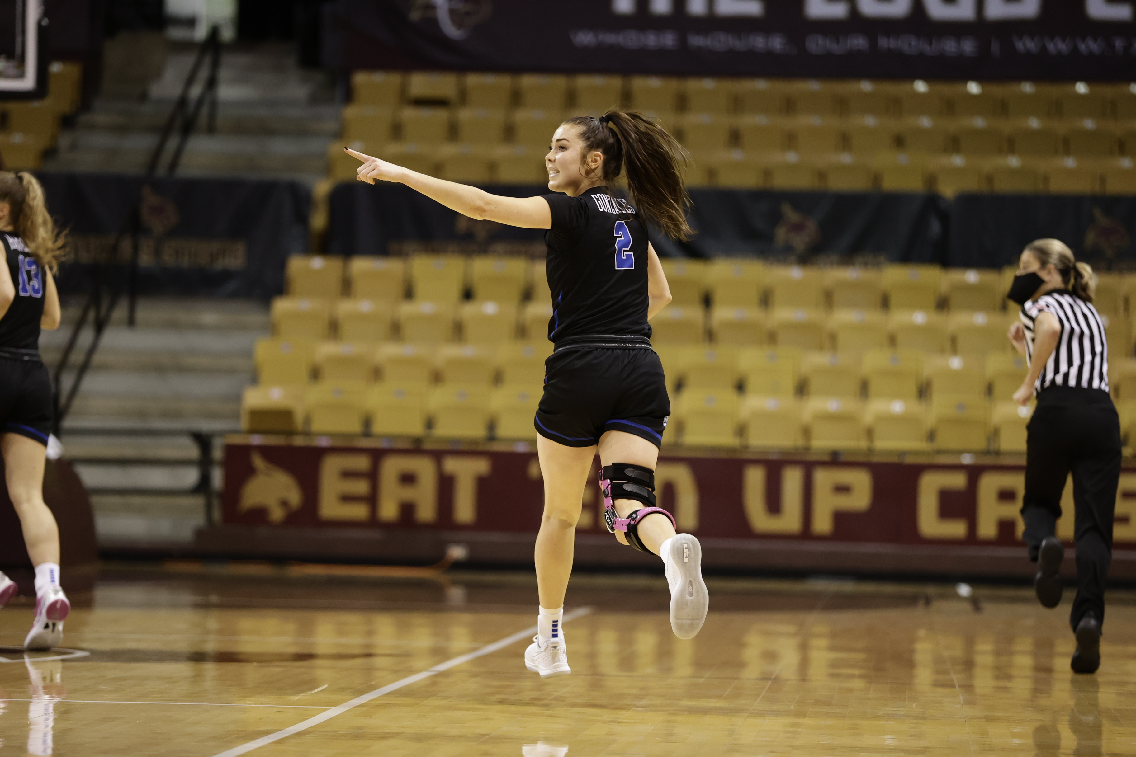 BYU guard Shaylee Gonzales celebrates a bucket against Rutgers in a NCAA women's basketball tournament first-round game Monday, March 22, 2021 in San Marcos, Texas.