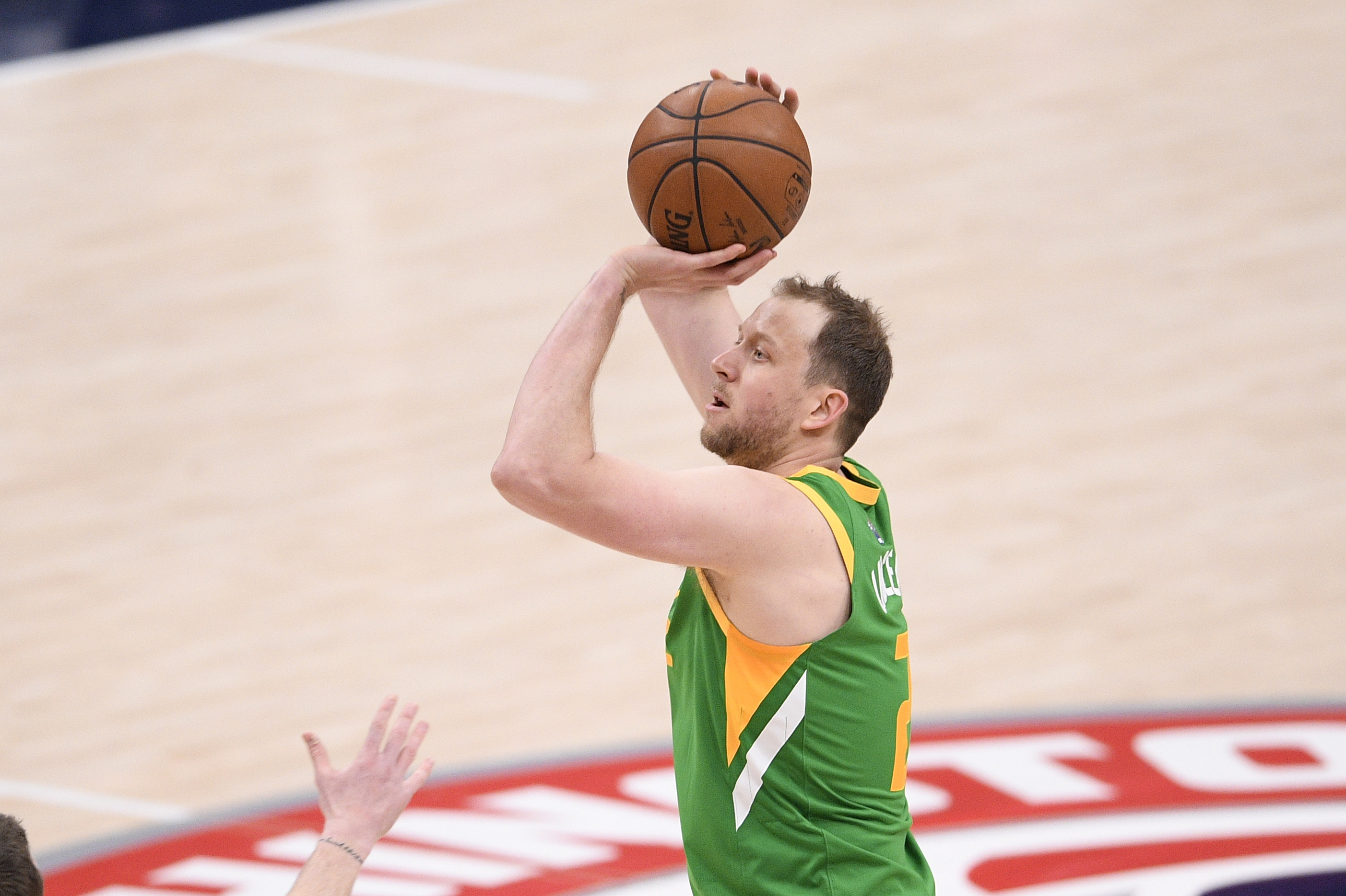 Utah Jazz guard Joe Ingles (2) shoots during the first half of an NBA basketball game against the Washington Wizards, Thursday, March 18, 2021, in Washington. (AP Photo/Nick Wass)