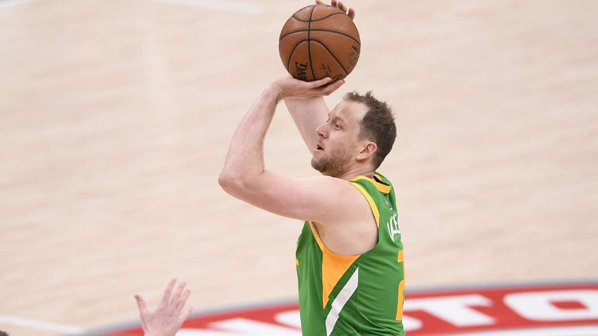 Utah Jazz guard Joe Ingles (2) shoots during the first half of an NBA basketball game against the Washington Wizards, Thursday, March 18, 2021, in Washington. (AP Photo/Nick Wass)