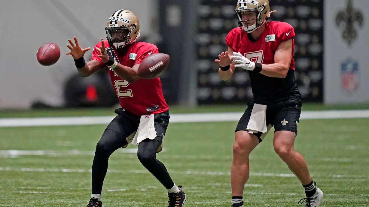 New Orleans Saints quarterbacks Jameis Winston (2) and Taysom Hill (7) go through drills during practice at their NFL football training facility in Metairie, La., Sunday, Aug. 23, 2020. Winston and Hill are expected to compete for the Saints’ starting quarterback job in 2021, with Drew Brees retired.