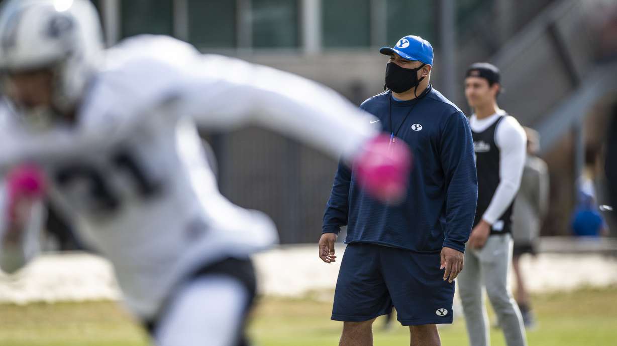 BYU football coach Kalani Sitake looks on during practice, March 18, 2021 in Provo.