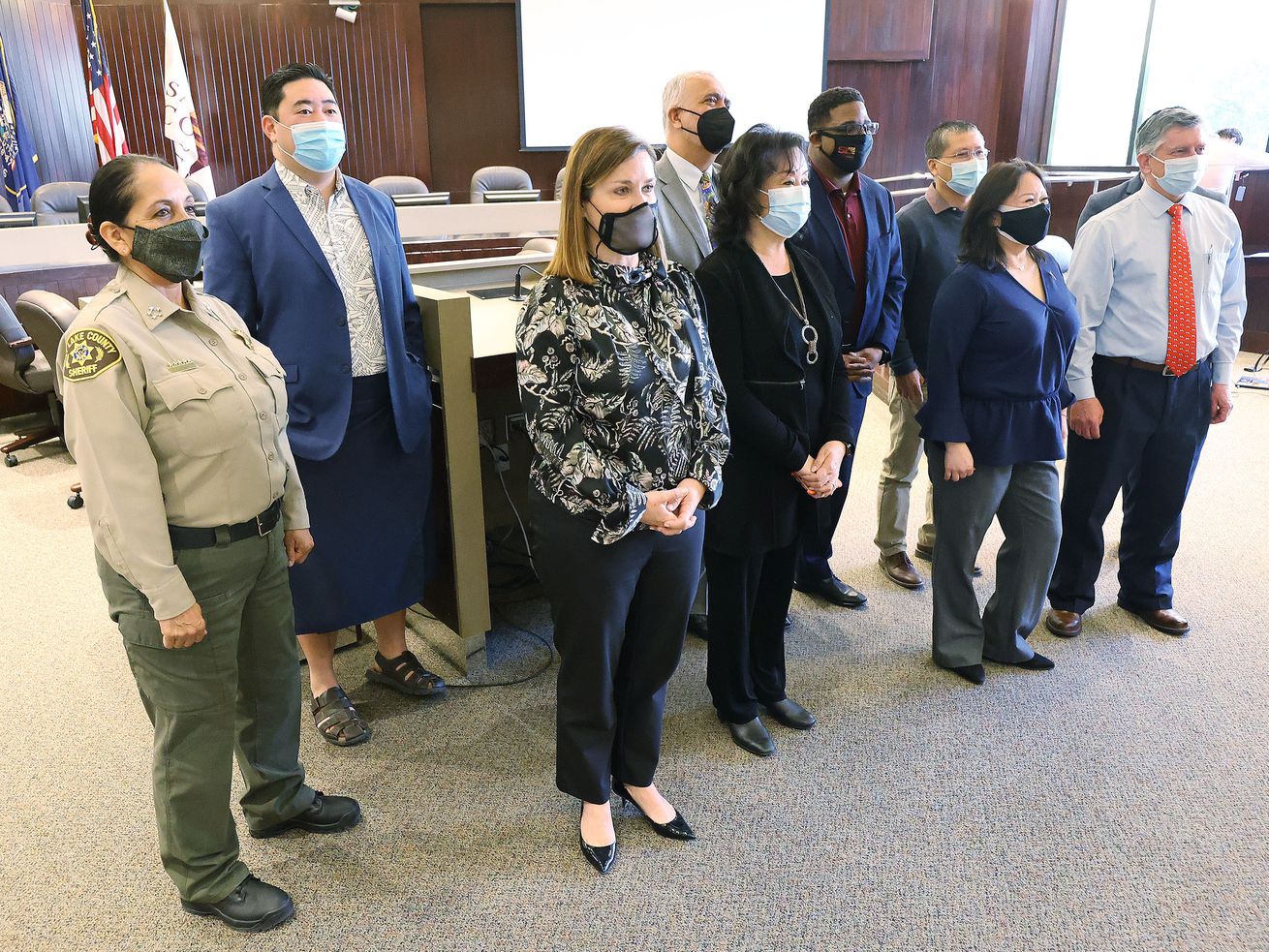 Salt Lake County Mayor Jenny Wilson, third from left,
joins other state and county leaders for a photo during a press
conference at the Salt Lake County Government Center in Salt Lake
City on Tuesday, March 23, 2021. The press conference aimed to
raise awareness about the 3,800 instances of violence against
people of Asian and Pacific Islander descent in the last year
across the country. Wilson also issued a call to action for
residents to denounce hate in all forms and support the local Asian
community.