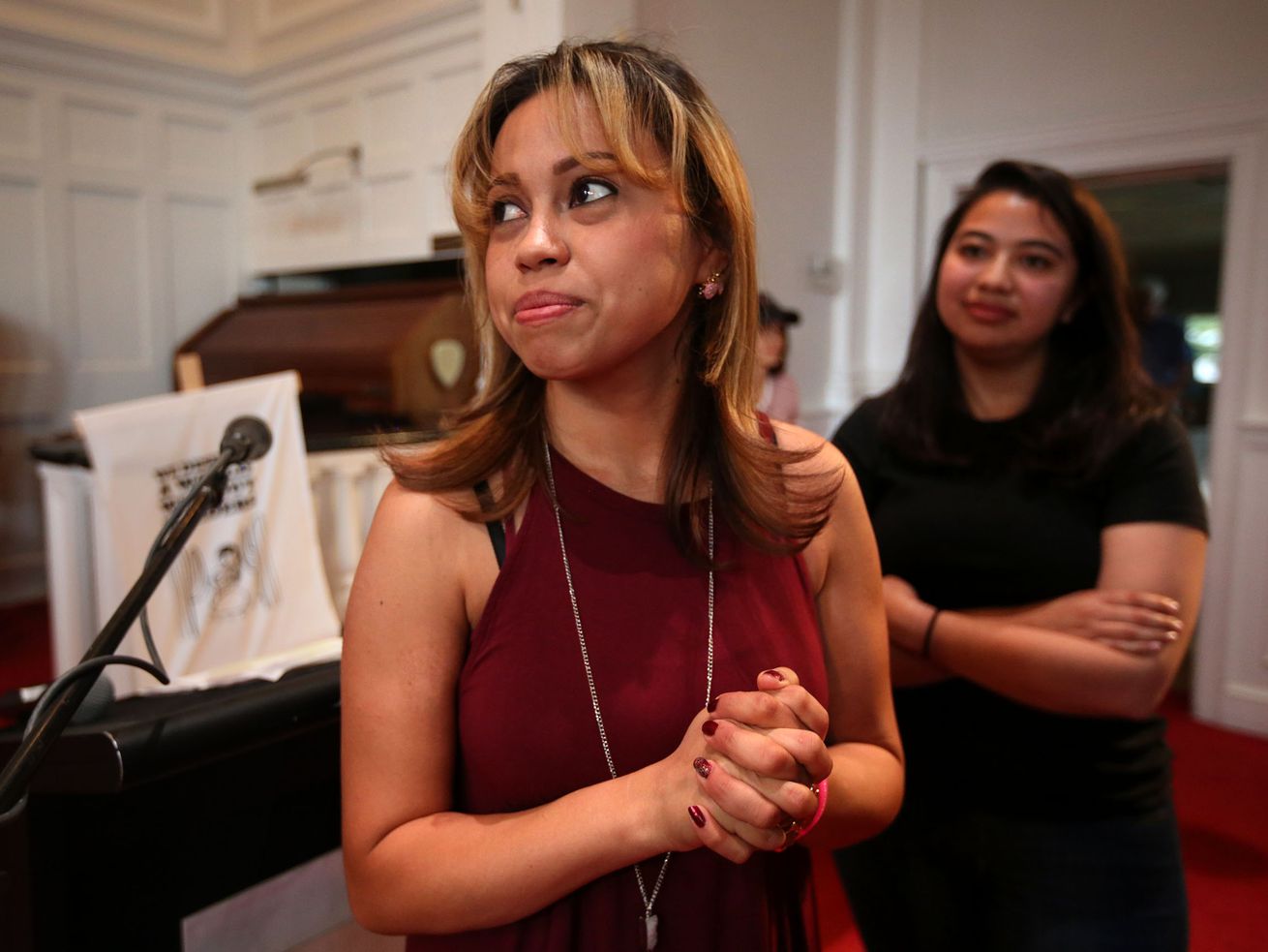 Vicky Chavez looks around after a press conference at
the First Unitarian Church in Salt Lake City on Monday, July 9,
2018.