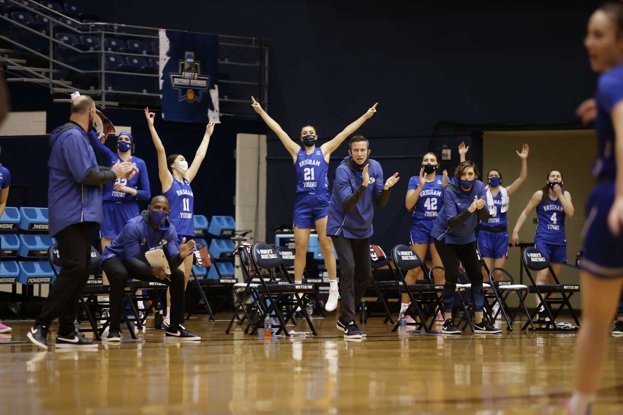 BYU guard Tahlia White celebrates on the bench during an NCAA women's basketball tournament second-round game, Wednesday, March 24, 2021 at the UTSA Convocation Center in San Antonio, Texas.