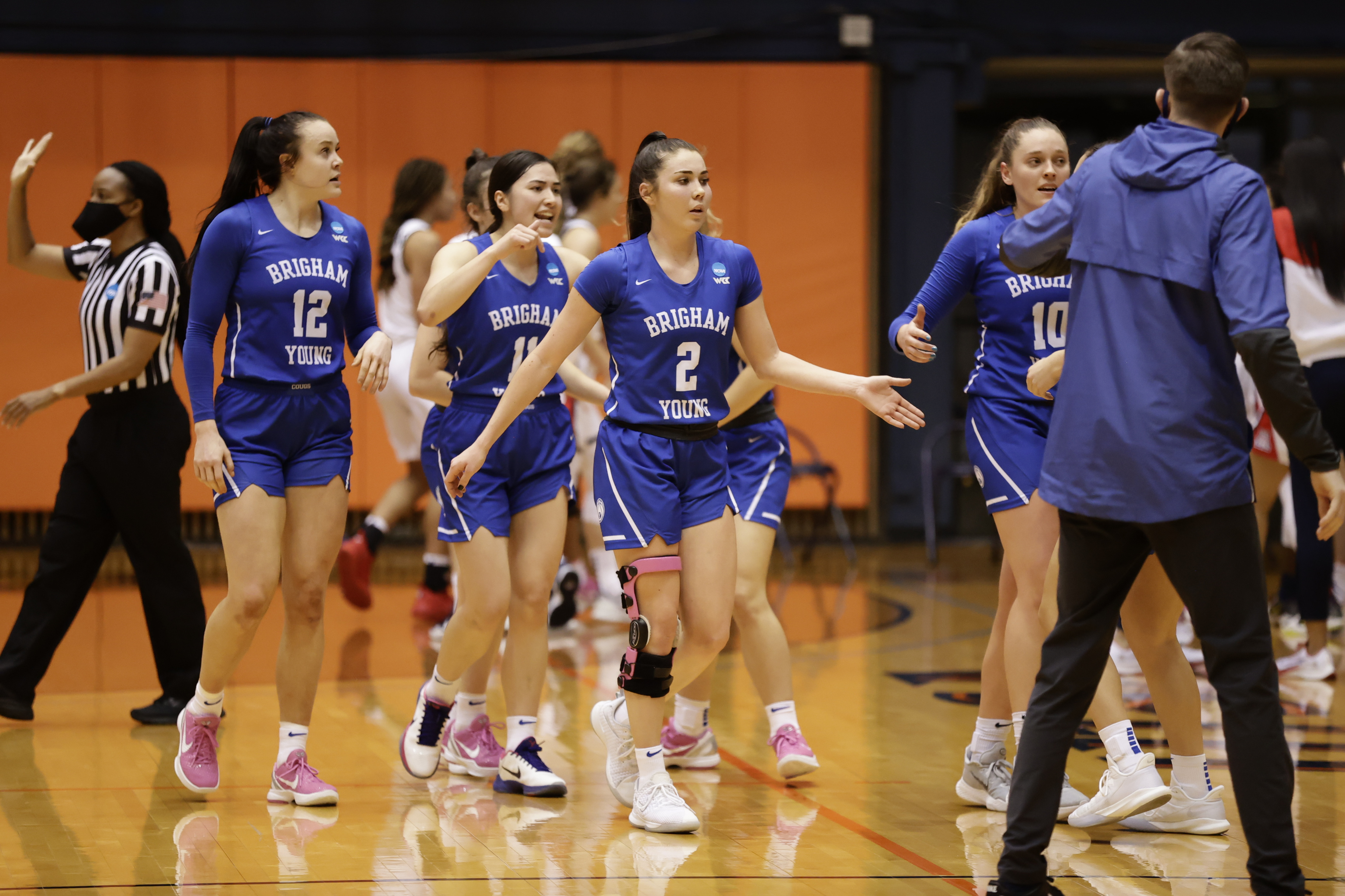 BYU guard Shaylee Gonzales, center, celebrates a big play in the final moments of an NCAA women's basketball tournament second-round game, Wednesday, March 24, 2021 at the UTSA Convocation Center in San Antonio, Texas.