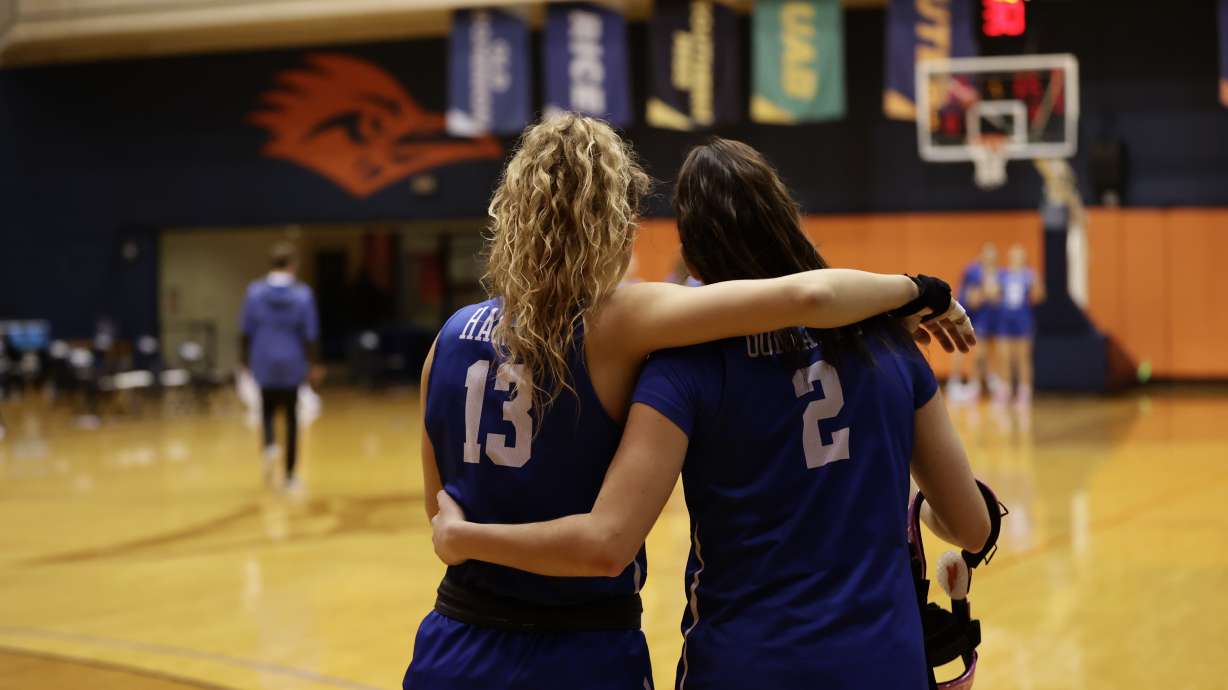 BYU guards Paisley Harding and Shaylee Gonzales embrace on the court after a loss to Arizona in the second round of the NCAA women's basketball tournament, Wednesday, March 24, 2021 at the UTSA Convocation Center in San Antonio, Texas.