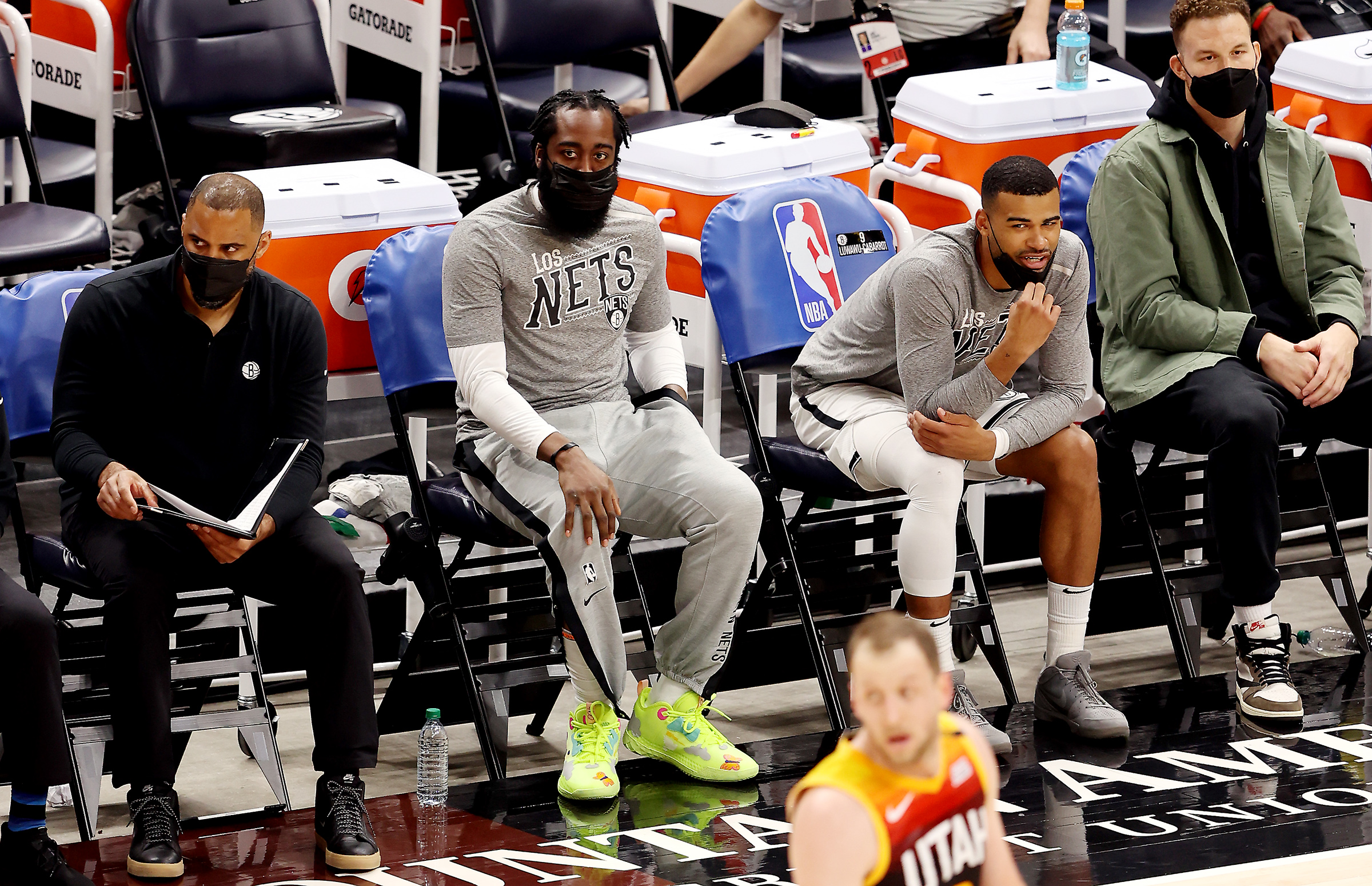 Brooklyn Nets guard James Harden (13) who didn’t play watches the action from the bench as the Jazz and the Nets play an NBA basketball game at Vivint Smart Home Arena in Salt Lake City on Wednesday, March 24, 2021. Utah won 118-88.