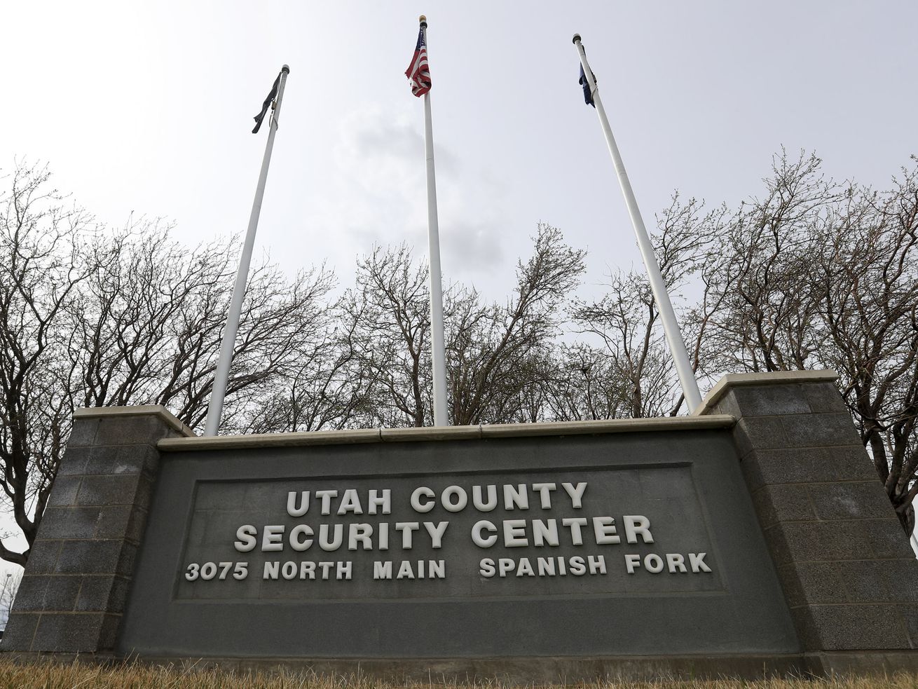 A sign at the entrance to the Utah County Jail in
Spanish Fork is pictured on Monday, March 22, 2021. Police say a
Saratoga Springs man who claimed he was trying to "catfish” others
on social media was booked into the jail Thursday and accused of
possessing child pornography.