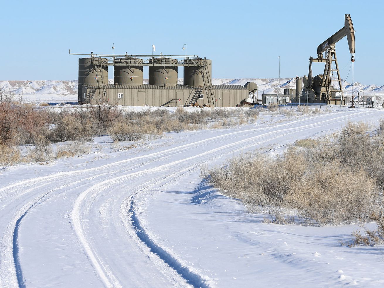 An oil pump works away near Roosevelt on Feb. 3, 2016.