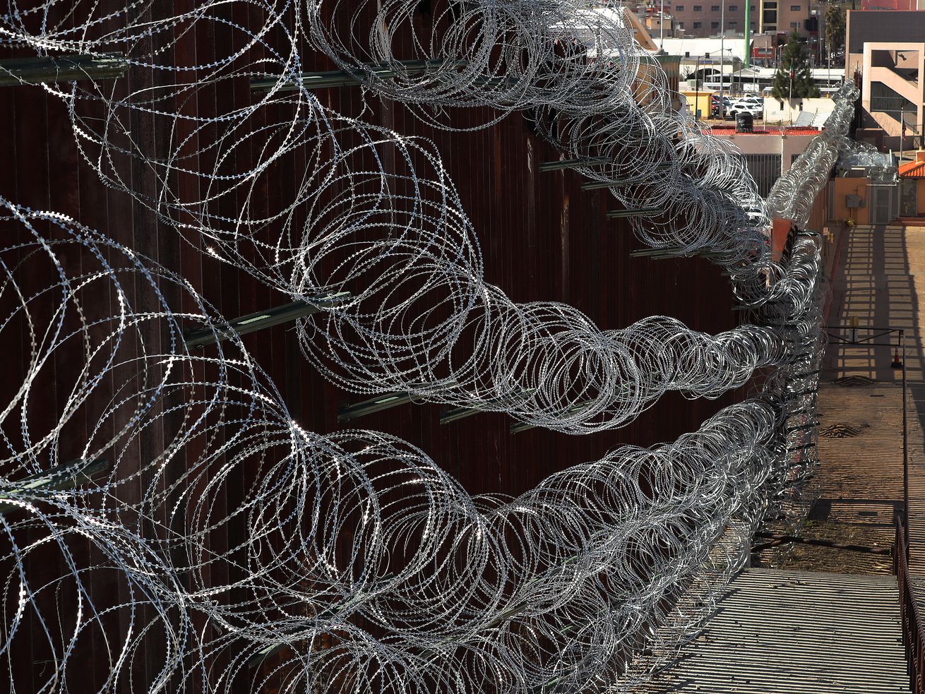 Concertina wire hangs from the U.S.-Mexico border wall
in Nogales, Arizona, on Feb. 12, 2019.