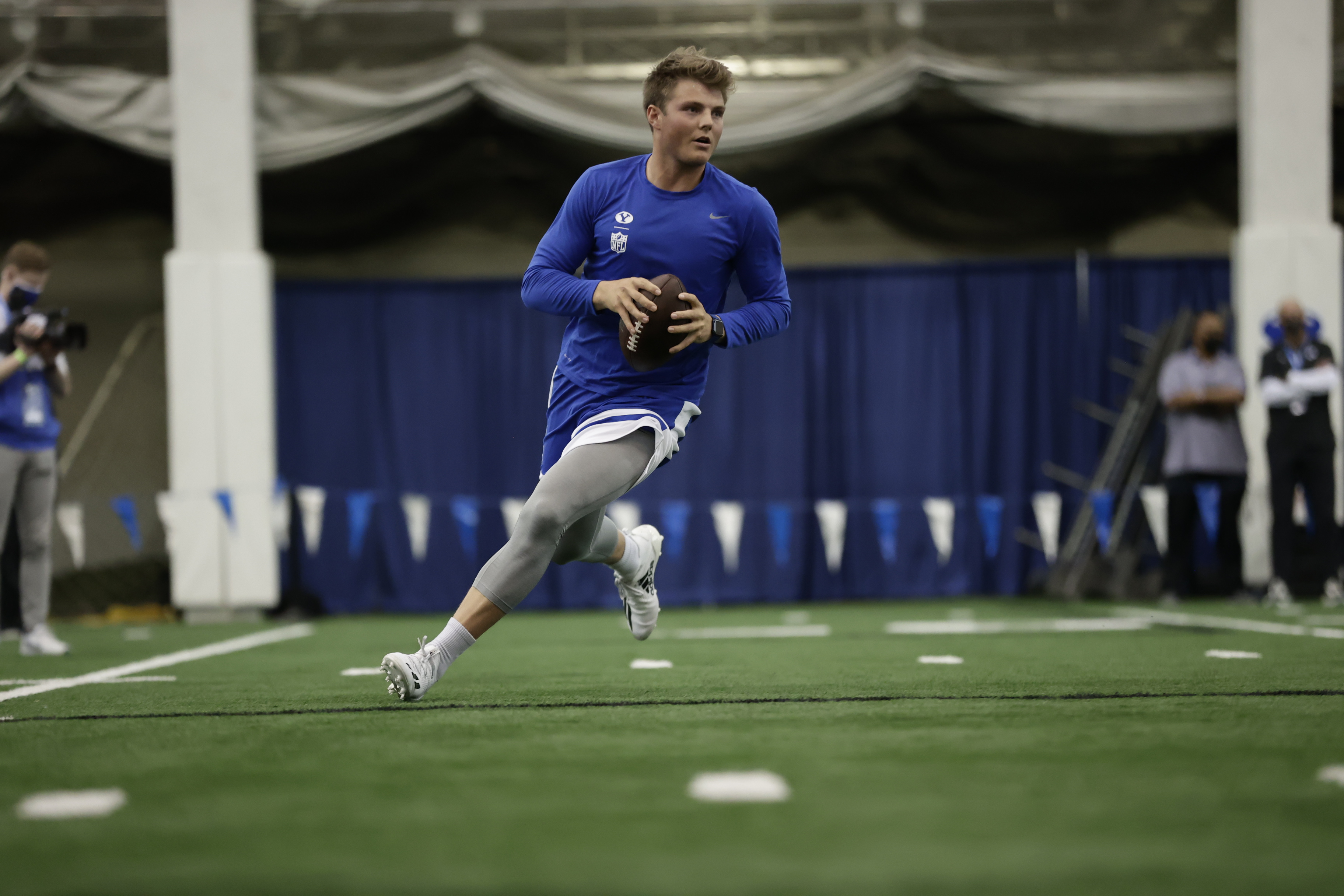 BYU quarterback Zach Wilson drops back to pass during BYU's pro day, Friday, March 26, 2021 in Provo.