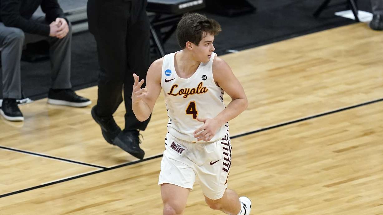 Loyola Chicago guard Braden Norris celebrates after making a 3-point basket during the first half of a Sweet 16 game against Oregon State in the NCAA men's college basketball tournament at Bankers Life Fieldhouse, Saturday, March 27, 2021, in Indianapolis.