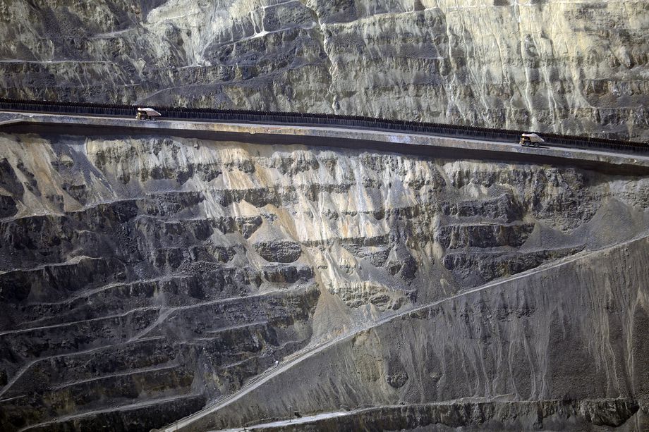 Haul trucks drive through Rio Tinto Kennecott’s Bingham Canyon Mine on April 26, 2019. The element tellurium, which is in high demand for its use in photovoltaic solar cells, will soon be recovered at the mine as a byproduct of copper smelting.