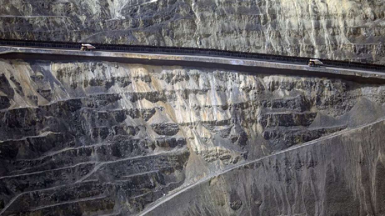 Haul trucks drive through Rio Tinto Kennecott’s Bingham Canyon Mine on April 26, 2019. The element tellurium, which is in high demand for its use in photovoltaic solar cells, will soon be recovered at the mine as a byproduct of copper smelting.