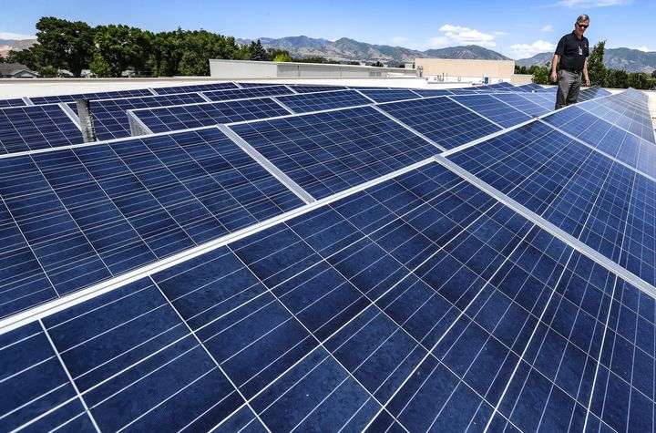 Greg Libecci, energy and resource manager for the Salt Lake City School District, stands with solar panels on the roof of Mountain View Elementary School in Salt Lake City on June 3, 2020. The element tellurium, which is in high demand for its use in photovoltaic solar cells, will soon be recovered at Rio Tinto Kennecott’s Bingham Canyon Mine as a byproduct of copper smelting.
