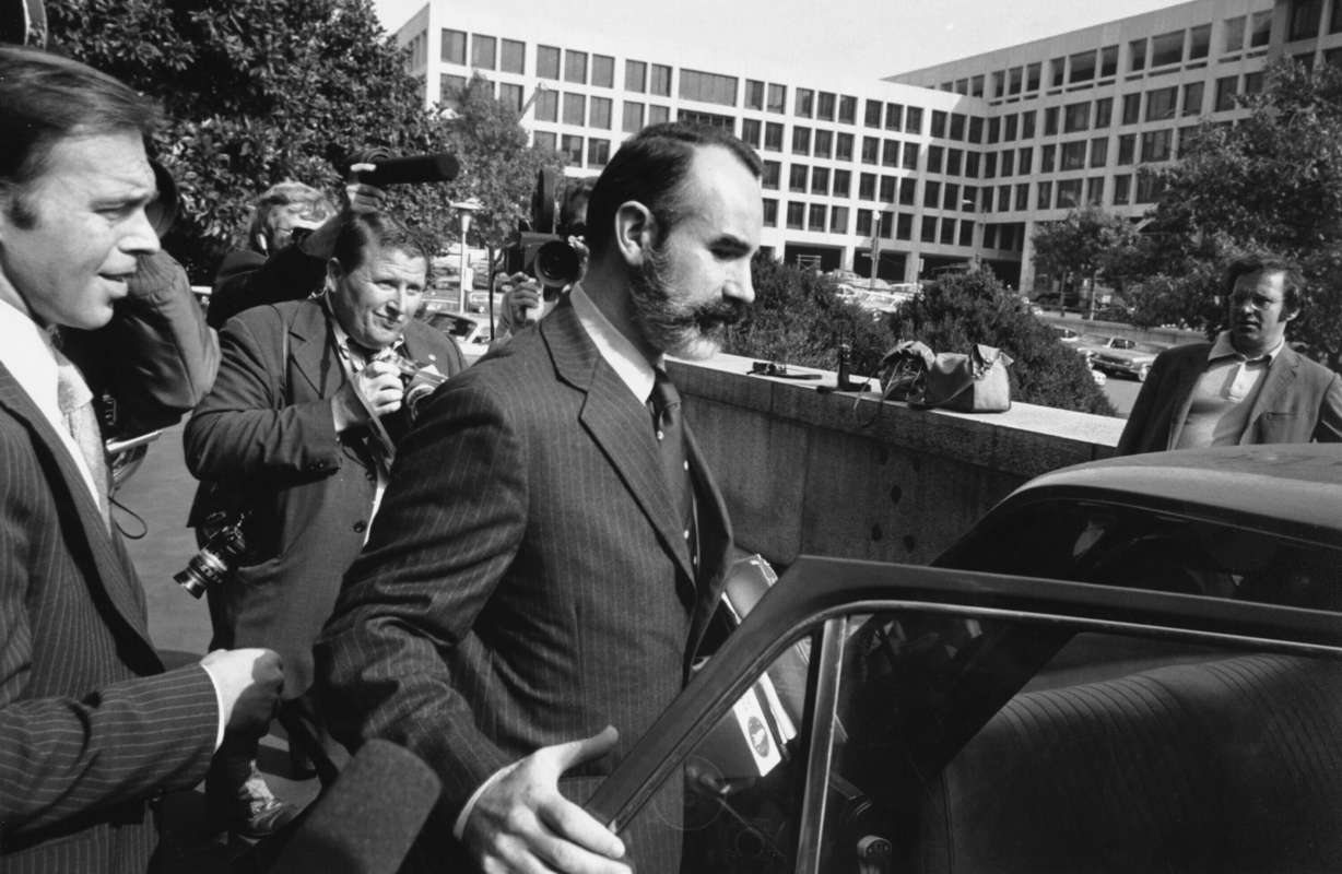 FILE - In this Oct. 15, 1974, file photo, G. Gordon Liddy wears a beard and a mustache upon his release in Washington. Liddy posted a $5,000 bond after serving 21 months in jail. Liddy, a mastermind of the Watergate burglary and a radio talk show host after emerging from prison, has died at age 90. His son, Thomas Liddy, confirmed the death Tuesday, March 30, 2021, but did not reveal the cause.