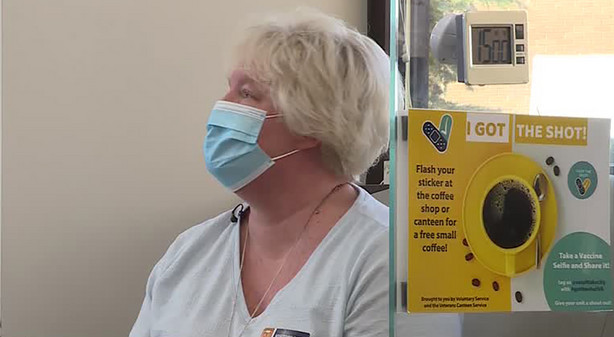 Lisa Maze, who retired in 2020 after 20 years in the Navy, gets her second dose of COVID-19 vaccine Tuesday, Mar. 30, 2021.