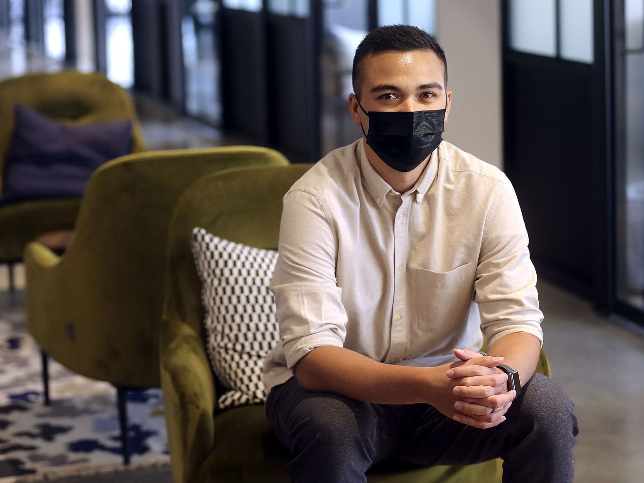 Dustin Watkins, DataBased co-founder, poses for a photo
at Kiln, a co-working space where Watkins has an office, in Lehi on
Tuesday, March 30, 2021. Watkins, who is Filipino, has heard of
multiple Asian people in Utah receiving hate letters recently.