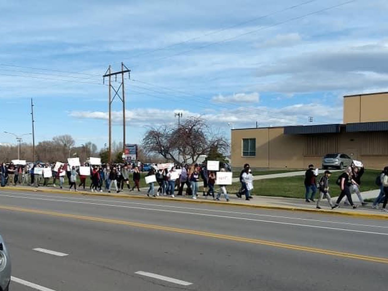 Students protest in front of Springville High School on
Monday, March 29, 2021. A teacher at the school has been placed on
paid administrative leave while Nebo School District officials
review complaints about alleged inappropriate comments and conduct
toward students.