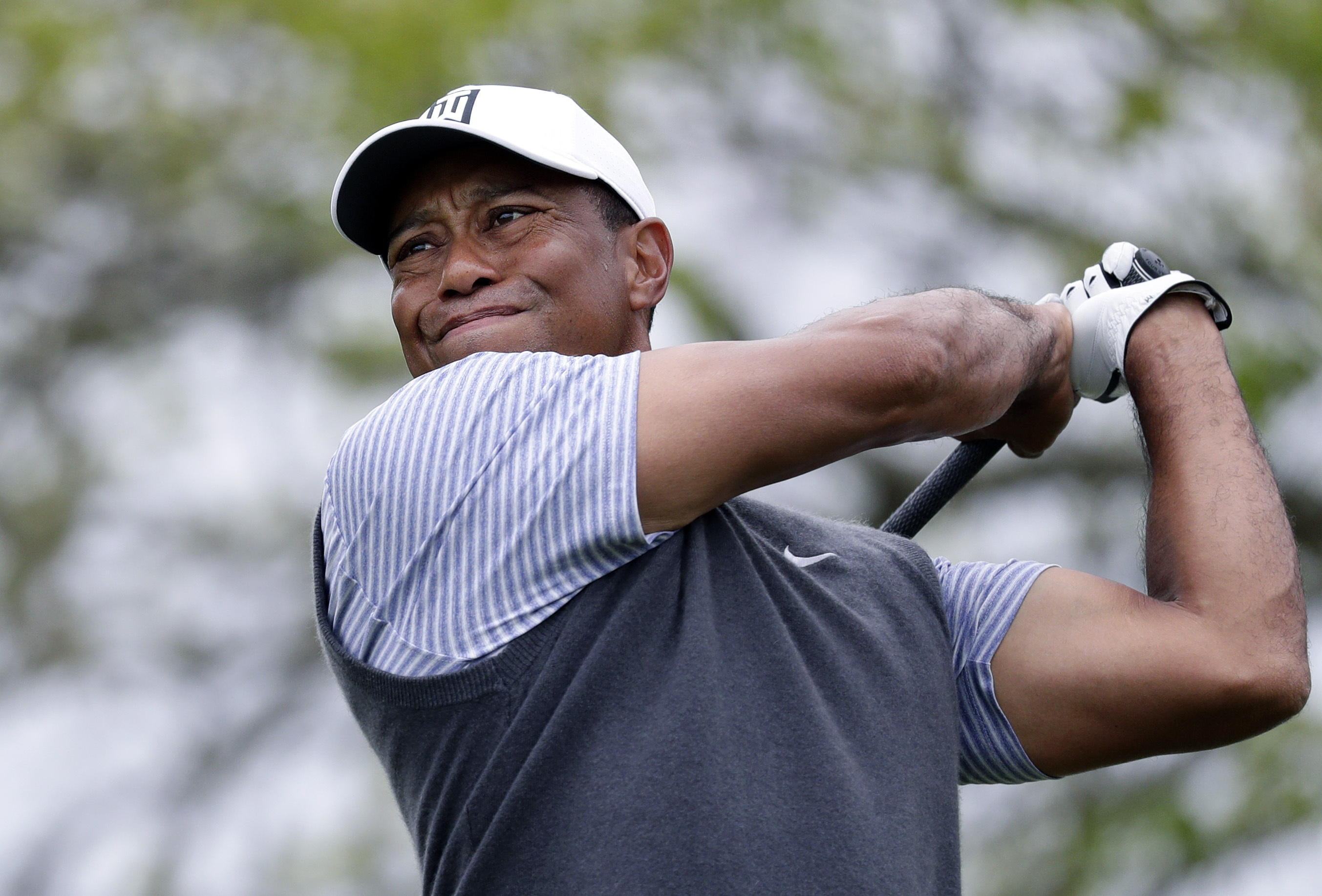 FILE - In this March 29, 2019, file photo Tiger Woods watches his drive on the sixth hole during round-robin play at the Dell Technologies Match Play Championship golf tournament, in Austin, Texas. The Los Angeles County sheriff says detectives have determined what caused Woods to crash his SUV last month in Southern California but would not release details on Wednesday, March 31, 2021, citing privacy concerns for the golf star.