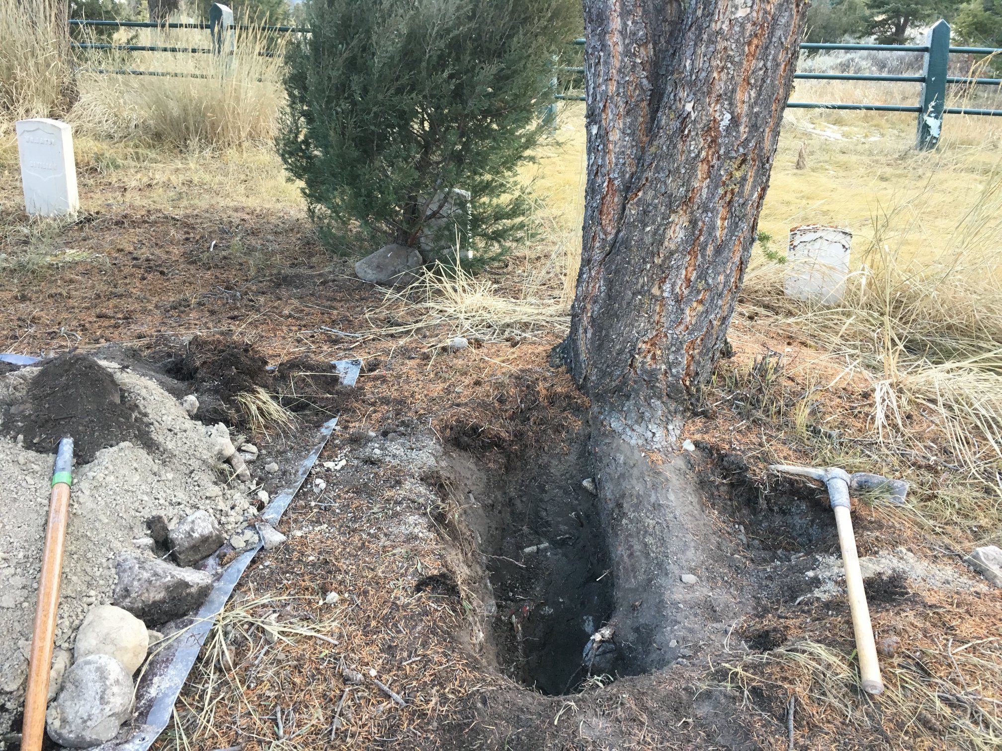 This undated photo shows damage to the cemetery at the Fort Yellowstone National Historic Landmark in Yellowstone National Park. Rodrick Dow Craythorn, a 52-year-old man from Syracuse, was sentenced this week in U.S. District Court in Wyoming in connection with the damage, which authorities say Craythorn caused while searching for a cache of buried treasure.