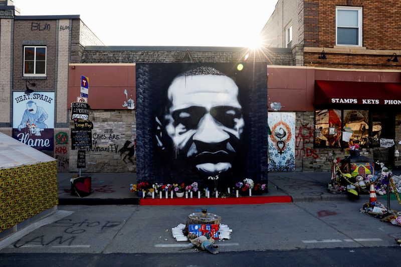FILE PHOTO: A view of a George Floyd mural located next to Cup Foods at George Floyd Square while the city of Minneapolis enters its third day of the trial of Derek Chauvin, who is facing murder charges in the death of George Floyd, in Minneapolis, Minnesota, U.S., March 31, 2021. REUTERS/Octavio Jones