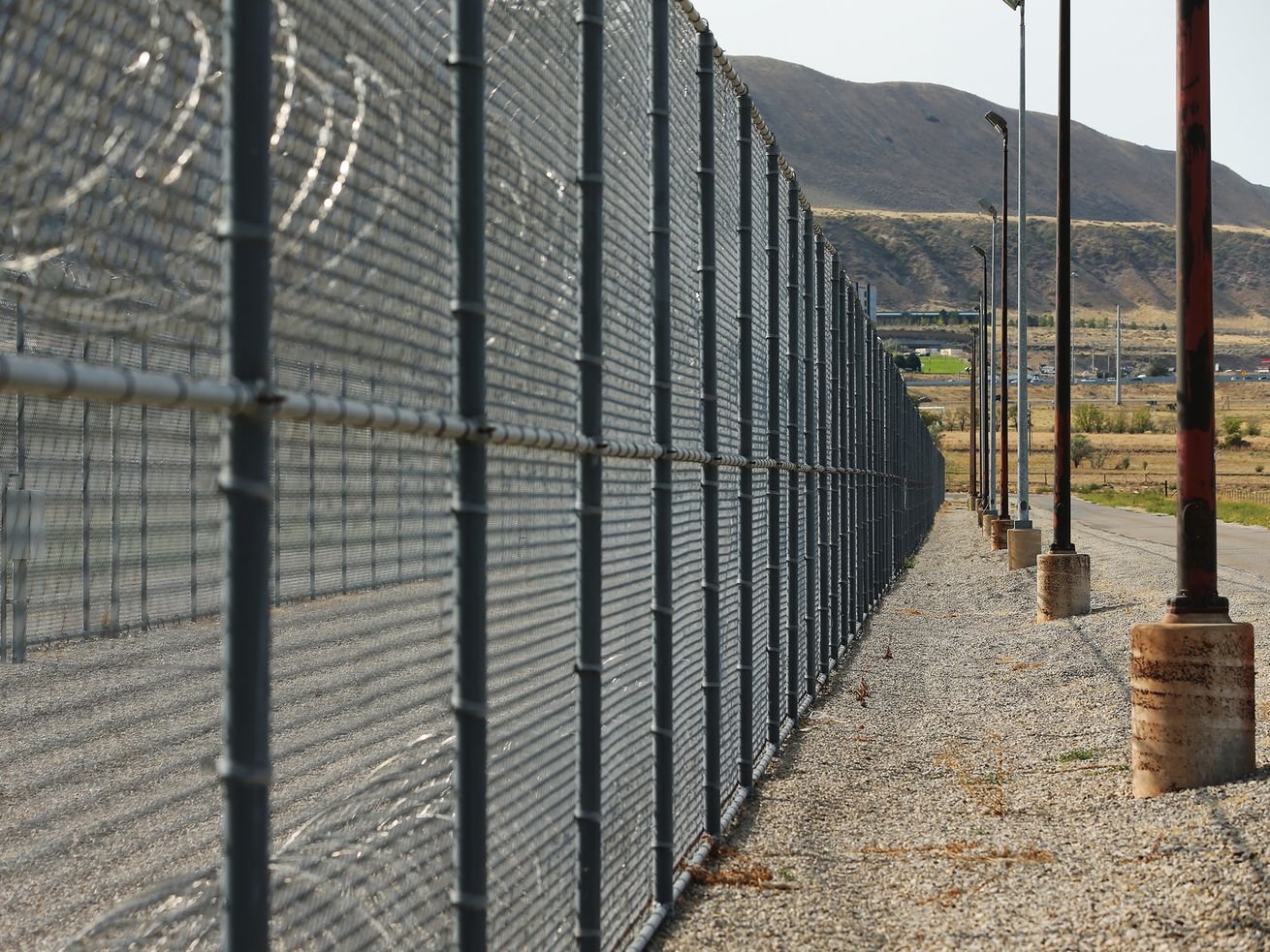 Razor wire and fencing at the Utah State Prison on
Monday, Sept 14, 2020. The Utah Board of Pardons and Parole has
granted a 2022 parole date to Carl Gary Wilcken, who has been in
prison since 2001 for the murder of Cynthia Boggs in Cedar City.