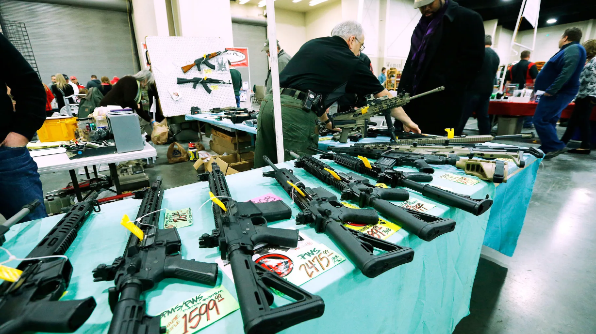 Guns at the Rocky Mountain Gun Show in January 2015. Utah Gov. Spencer Cox and Sen. Mike Lee, both Republicans, criticized New Mexico's governor over a public health order to ban carrying guns in Albuquerque.