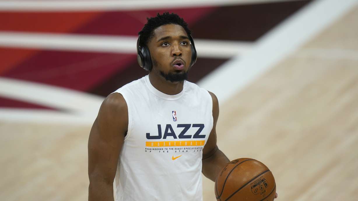 Utah Jazz guard Donovan Mitchell warms up before the start of their NBA basketball game against the Brooklyn Nets Wednesday, March 24, 2021, in Salt Lake City. (AP Photo/Rick Bowmer)