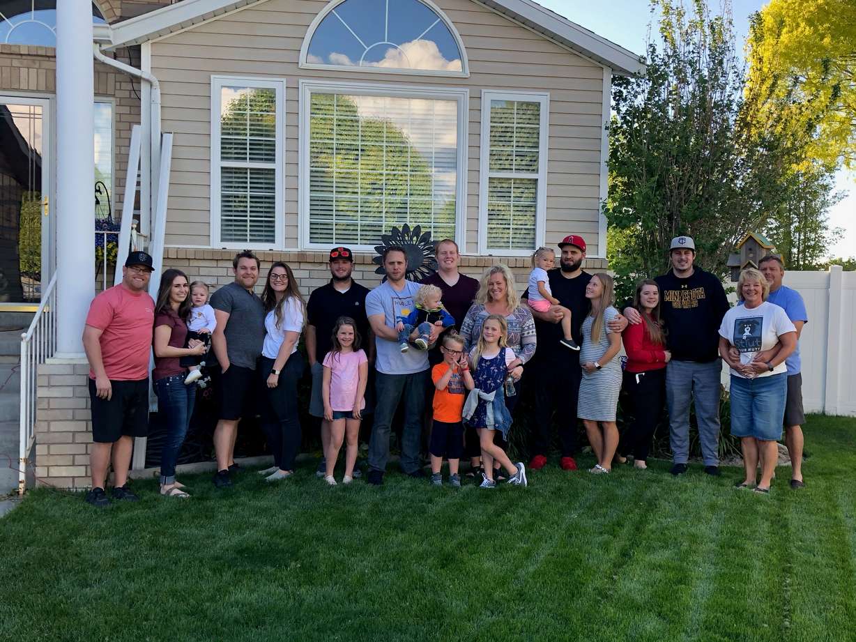 Bruce Madsen poses with his family, including his four children and six grandchildren. He has one more grandchild on the way.