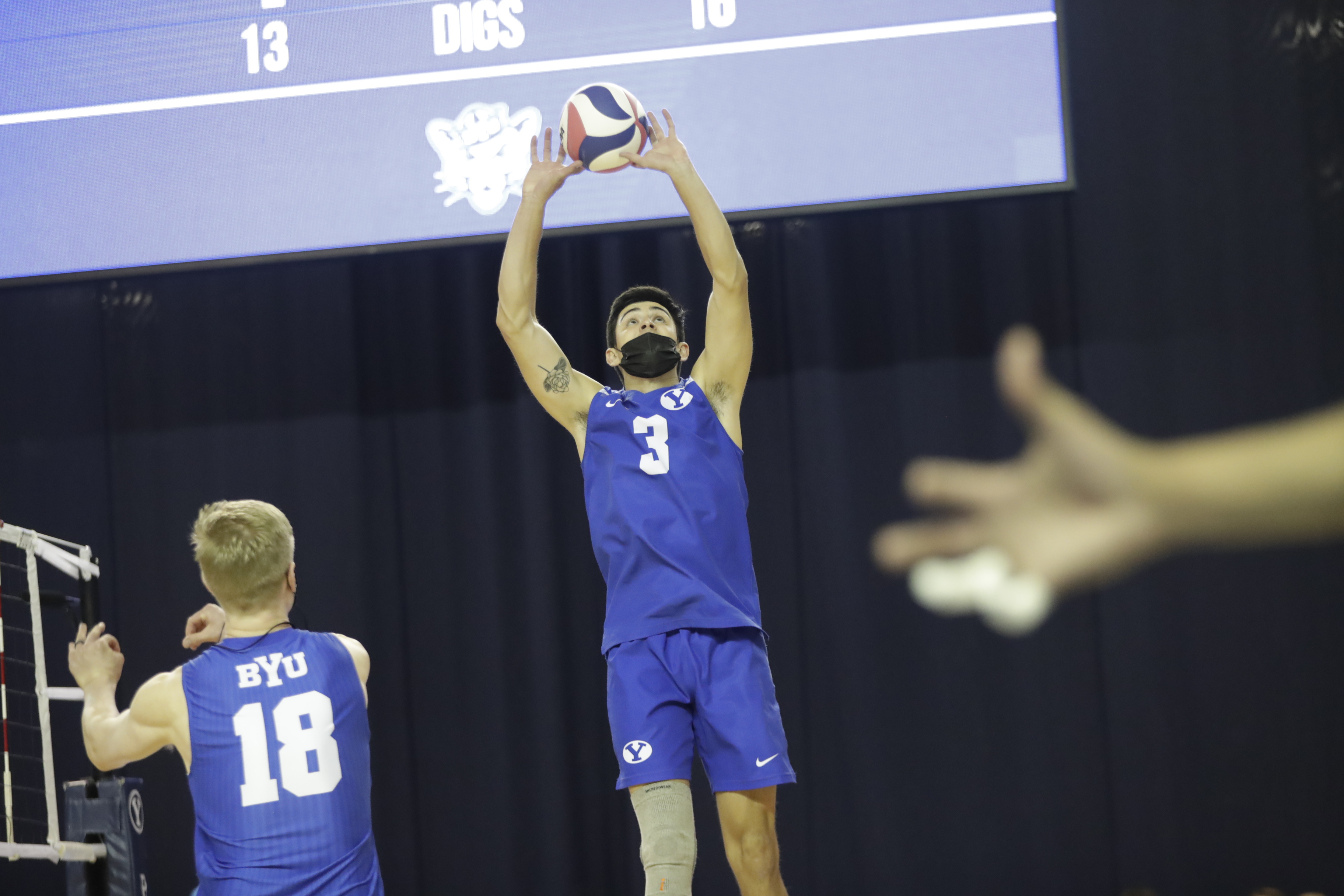 BYU setter Wil Stanley (3) sets a ball during a match against USC, Friday, April 3, 2021 in Provo.