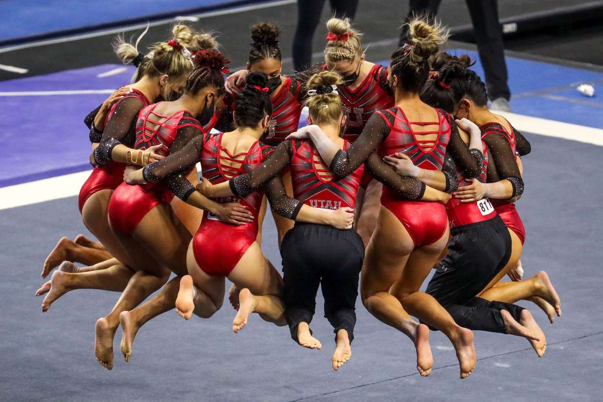 The Utah Utes huddle during the NCAA regional final round at the Maverik Center on Saturday, April 3, 2021. The Utes are moving on to the next round.