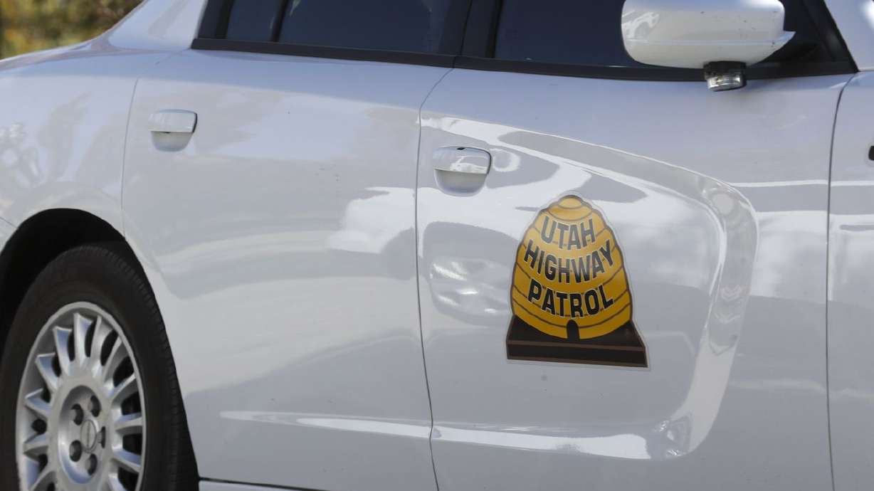 A driver was critically injured early Tuesday after hitting a concrete barrier and then being hit by a semitruck on I-15 in Pleasant View, troopers said.