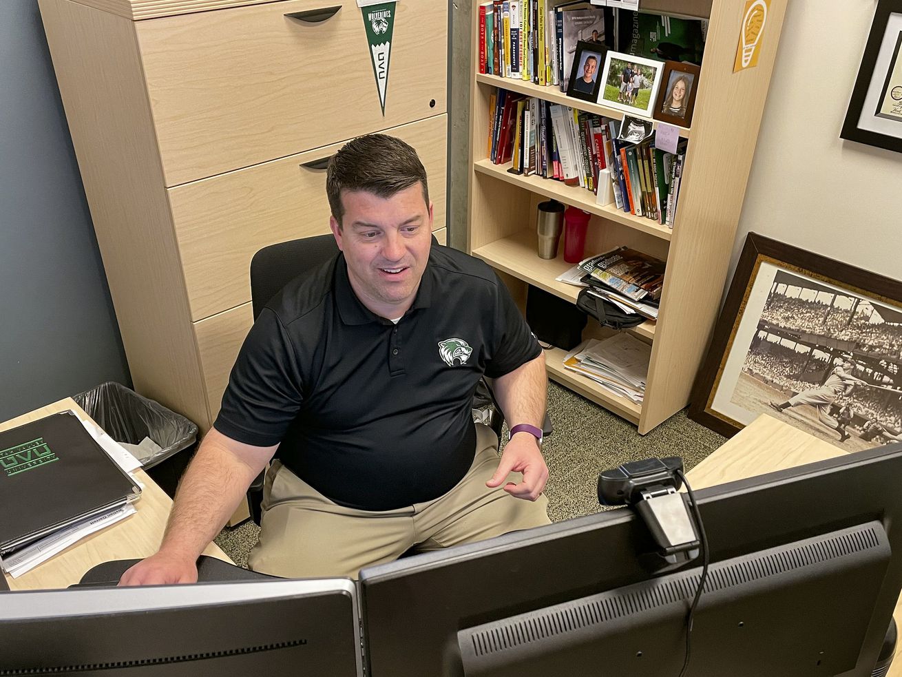 Utah Valley University career counselor Travis Reynolds
helps a student with her LinkedIn profile and portfolio during a
virtual call in his office in the Career Development Center on the
university’s Orem campus April 2, 2021.