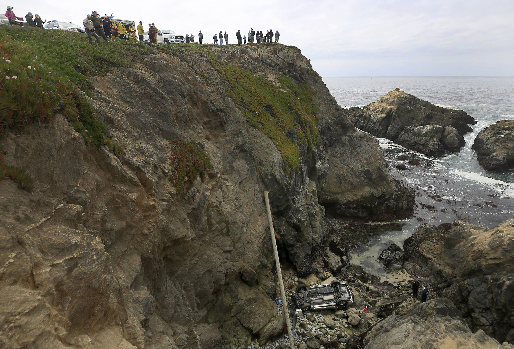 Car that plunged off California cliff drove through big lot