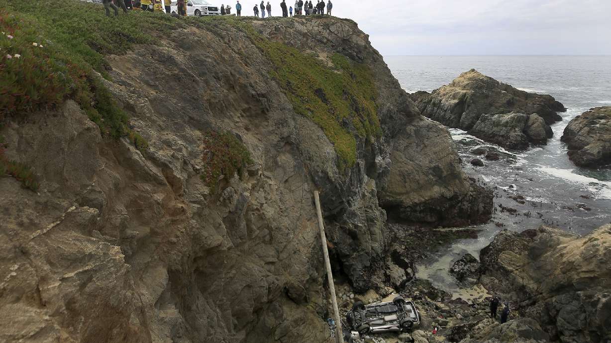 Car that plunged off California cliff drove through big lot