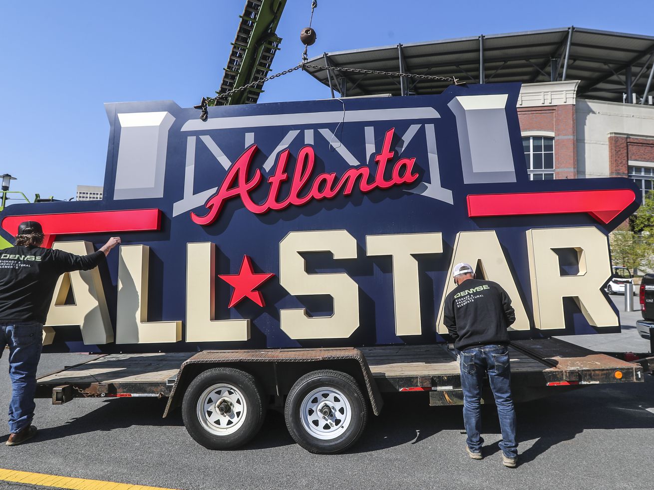 Workers load an All-Star sign onto a trailer after it
was removed from Truist Park in Atlanta, Tuesday, April 6, 2021.
Members of Utah’s all-Republican congressional delegation say large
corporations, including Major League Baseball, are bowing to
"misinformed” political pressure in their response to Georgia’s
controversial new voting laws.