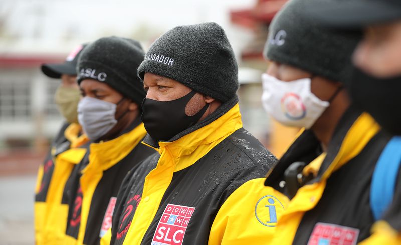Downtown ambassador Shawn Clay and others listen during
a press conference on a vision for providing community resources
and increased safety in the North Temple area in Salt Lake City on
Tuesday, April 6, 2021.