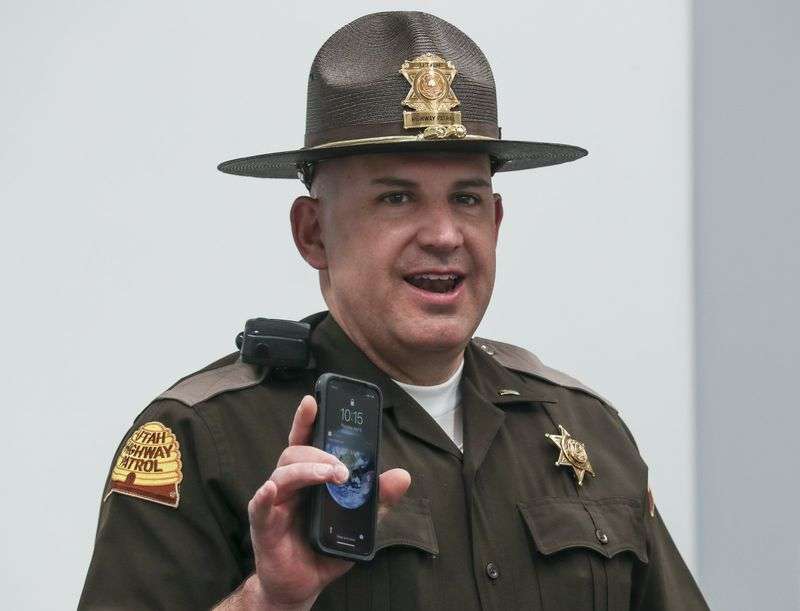 Utah Highway Patrol Lt. Wade Breur announces a
distracted driver blitz during a press conference at the Calvin
Rampton Complex in West Valley City on Thursday, April 8, 2021. The
UHP and 20 other agencies will conduct the statewide effort through
Monday morning, with the main focus in Salt Lake and Utah counties.
Police in marked patrol cars, unmarked vehicles and motorcycles
will be patrolling both the freeways and side streets.