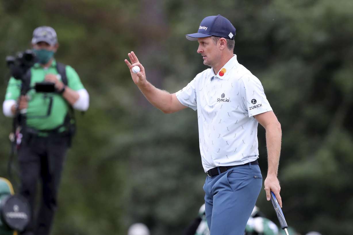 Justin Rose reacts to his birdie shot on the seventeenth hole during the first round of the Masters golf tournament at Augusta National Golf Club, Thursday, April 8, 2021, in Augusta, Ga.