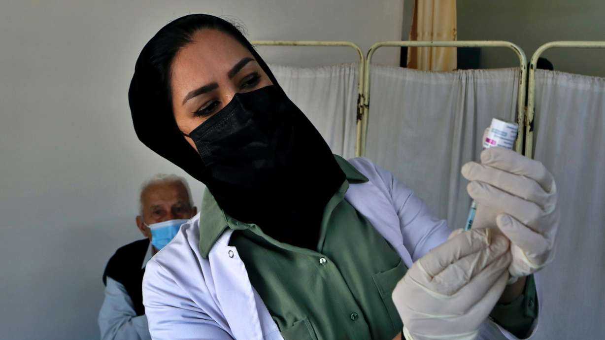 Iraq blames public for new virus record, urges vaccinations