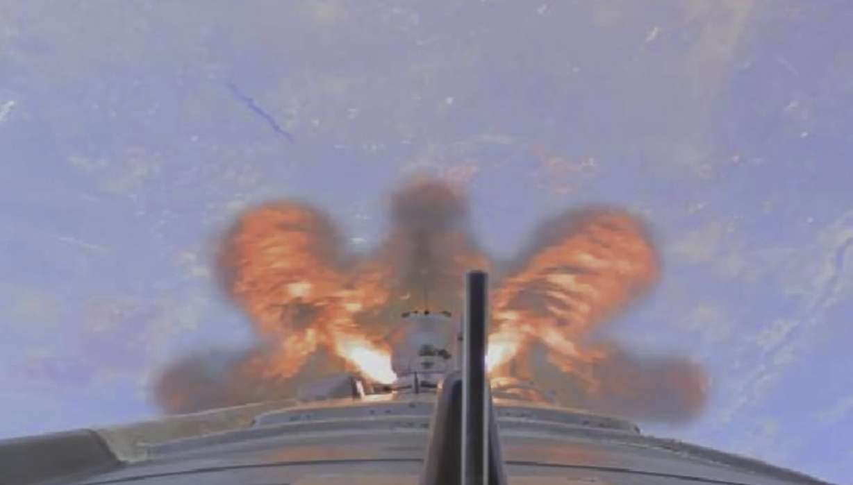 In this photo taken from video footage released by the Roscosmos Space Agency from onboard camera, the Soyuz-2.1a rocket booster with Soyuz MS-18 space ship carrying a new crew to the International Space Station, ISS, flies after the launch from the Russian leased Baikonur cosmodrome, Kazakhstan, Friday, April 9, 2021.