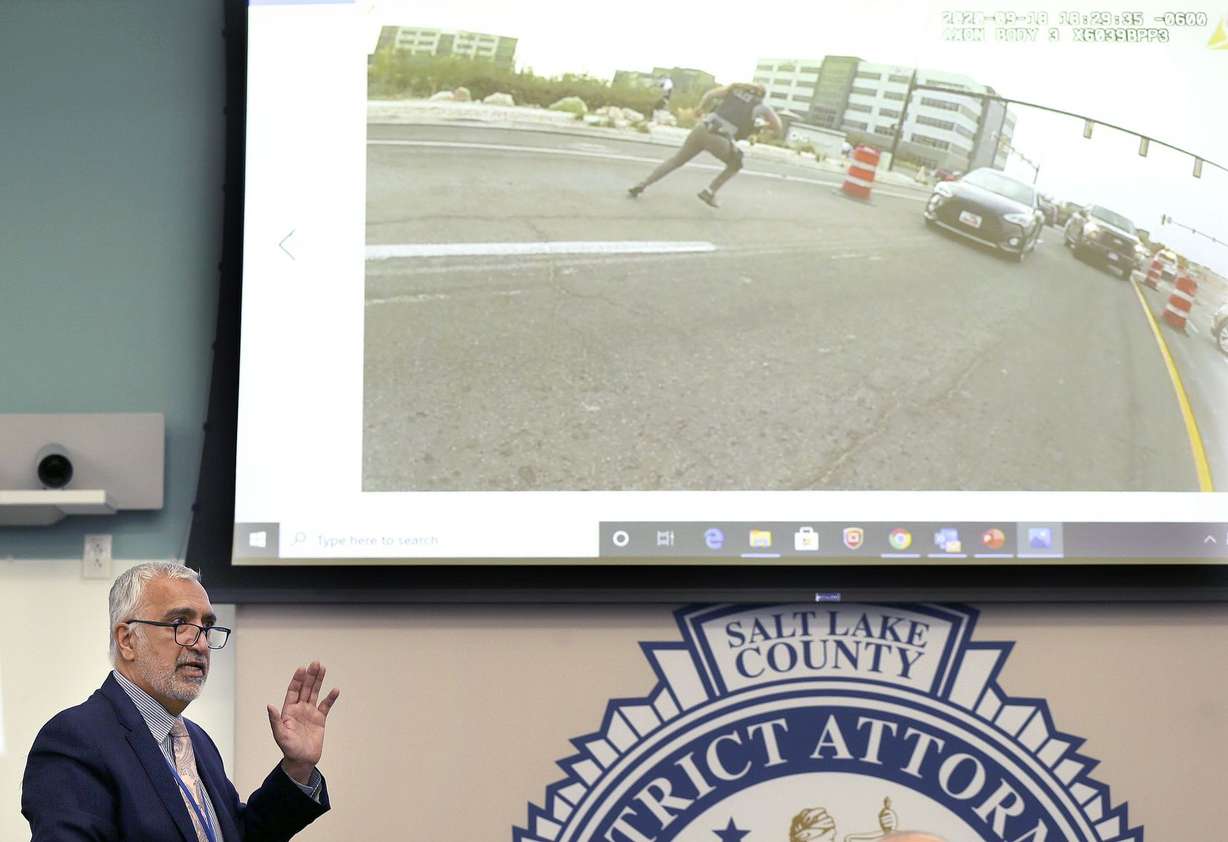 District Attorney Sim Gill plays video from a Sept. 18, 2020, officer-involved shooting during a press conference at the District Attorney’s Office building in Salt Lake City on Friday, April 9, 2021. Gill’s office announced three police officers who shot and killed Matthew C. Knowlden, 22, after he pointed a gun at them were legally justified in doing so, even though the man never fired a shot.
