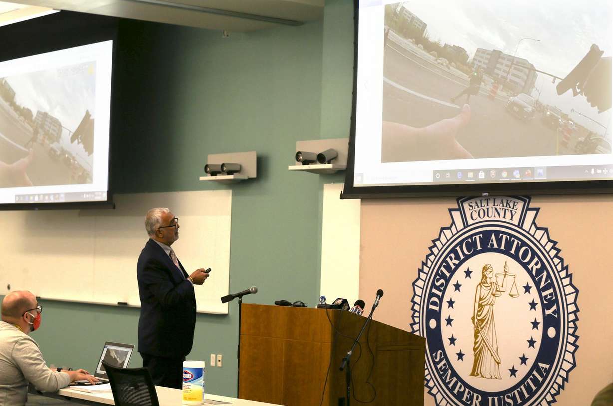 District Attorney Sim Gill plays video from a Sept. 18, 2020, officer-involved shooting during a press conference at the District Attorney’s Office building in Salt Lake City on Friday, April 9, 2021. Gill’s office announced three police officers who shot and killed Matthew C. Knowlden, 22, after he pointed a gun at them were legally justified in doing so, even though the man never fired a shot.
