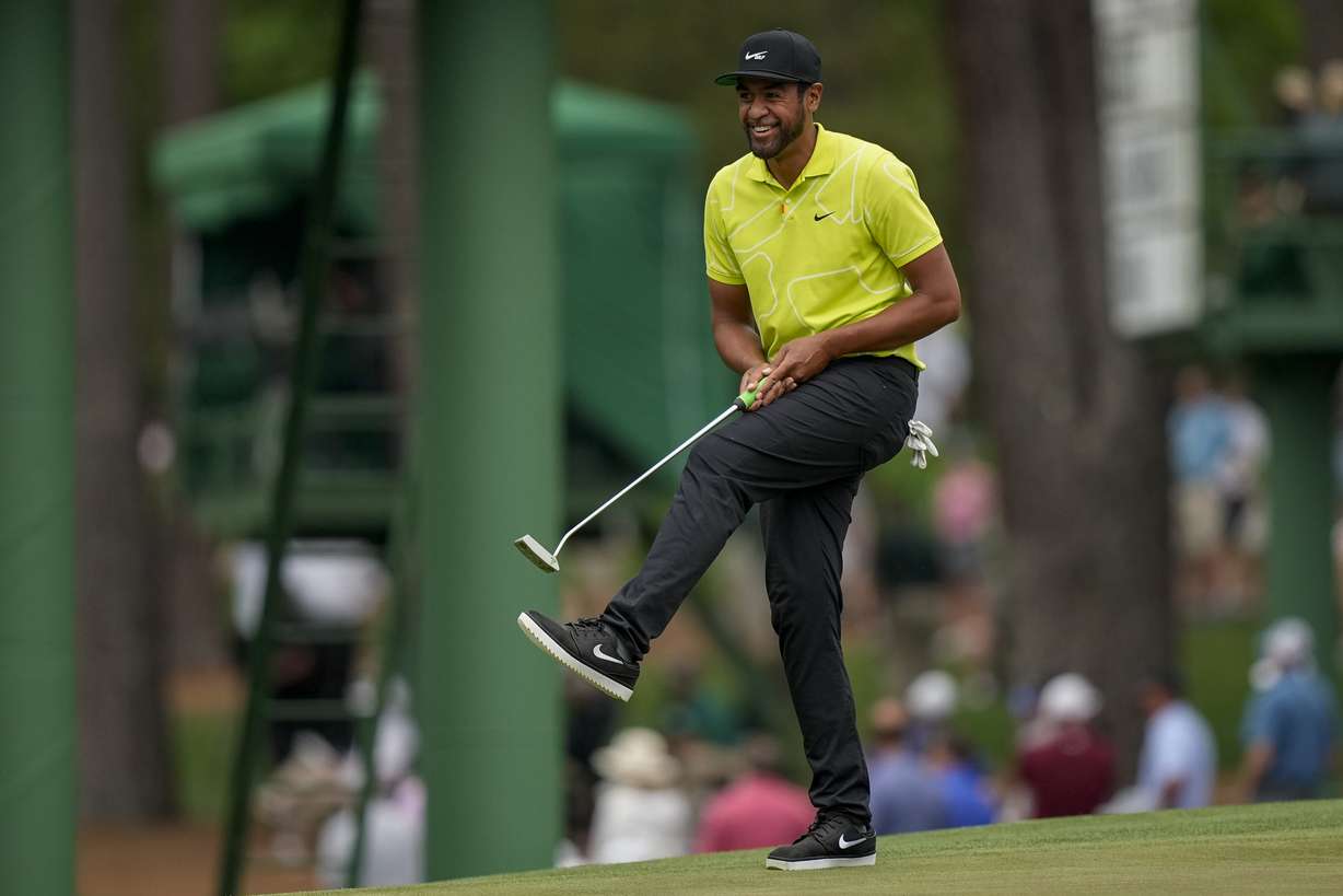 Tony Finau reacts after missing an eagle putt on the 15th hole during the second round of the Masters golf tournament on Friday, April 9, 2021, in Augusta, Ga.