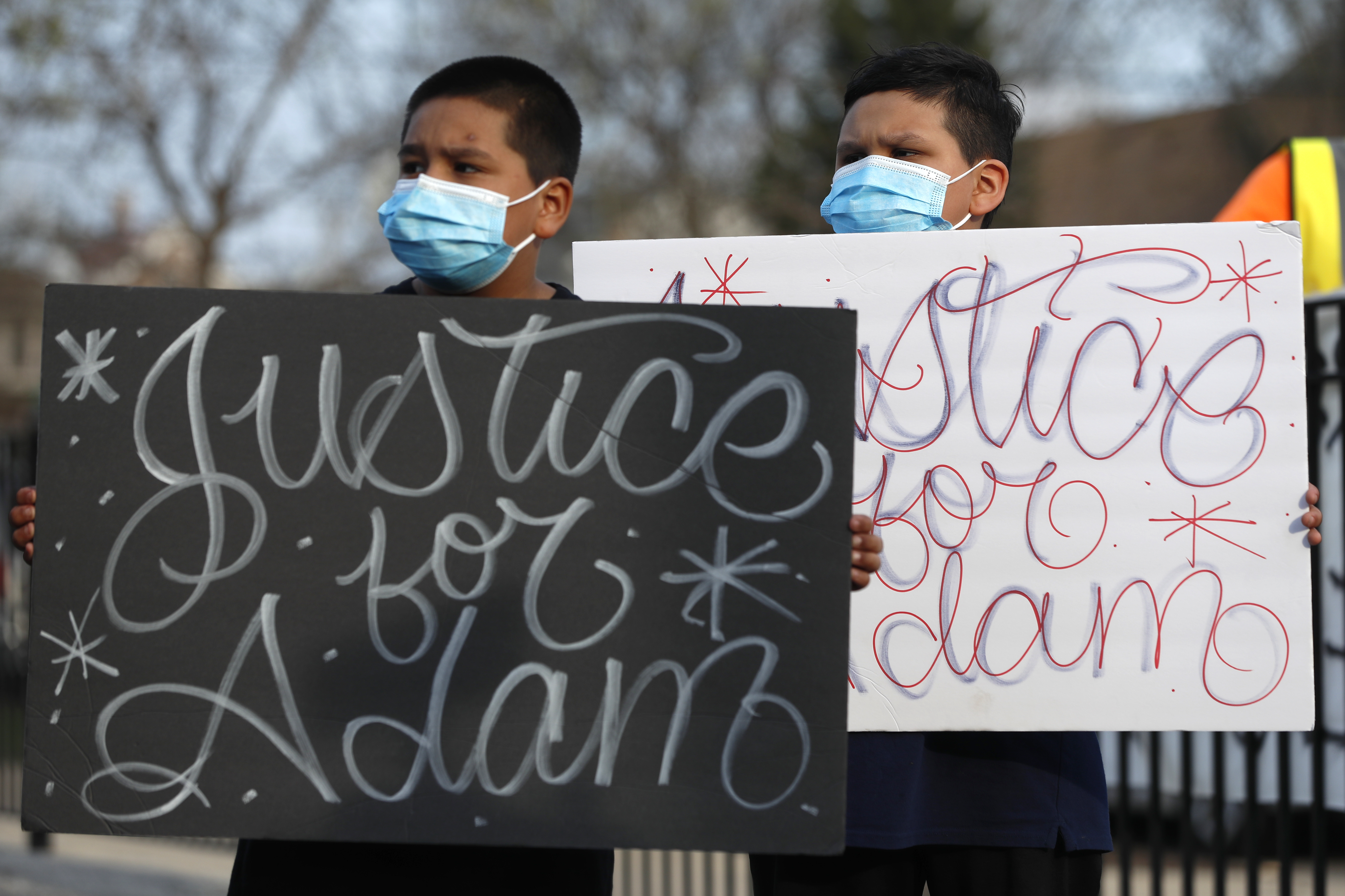 Prosecutors: Boy shot by police was with man who fired gun