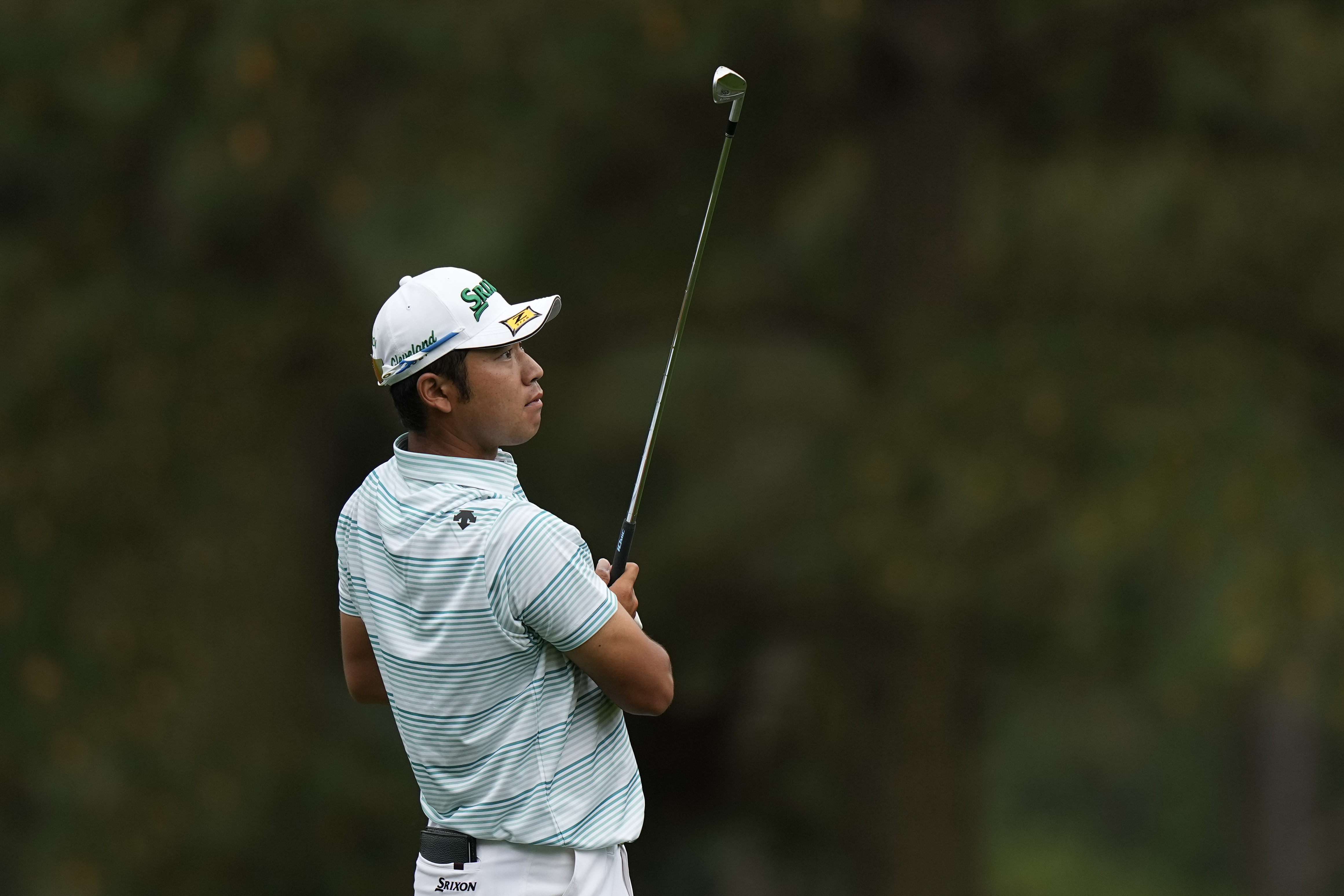 Hideki Matsuyama, of Japan, watches his shot on the 15th hole during the third round of the Masters golf tournament on Saturday, April 10, 2021, in Augusta, Ga.
