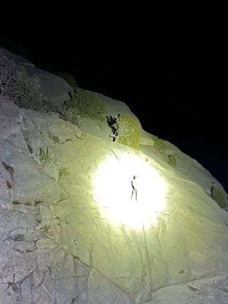 Two stranded climbers in Little Cottonwood Canyon were able to climb to safety after a search and rescue team used high-powered lights to guide them to a safe descent Friday night