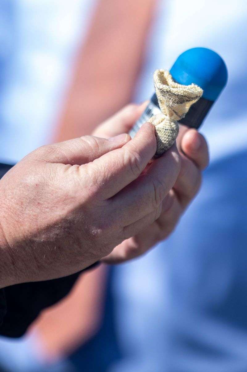 Sgt. Keith Horrocks compares ammunition bag for a new
less-lethal shotgun with a foam 40 mm round during a demonstration
at the Salt Lake City Police Airport Training Facility in Salt Lake
City on Monday, April 12, 2021.
